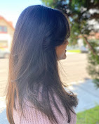 Long dark glossy hair, back view