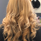 Golden blonde curls, back view